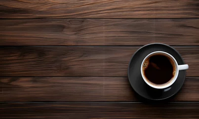 Foto op Aluminium the background of a cup of coffee seen from above on a wooden base © Red Rubah
