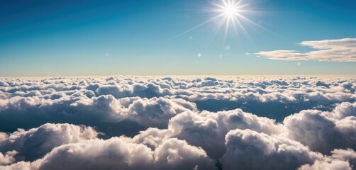  the sun shines above the clouds on a sunny day in this photo taken from a plane on a clear day.