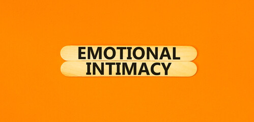 Emotional intimacy symbol. Concept words Emotional intimacy on beautiful wooden stick. Beautiful...
