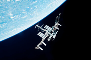 ISS above the surface of planet earth. Elements of this image furnished by NASA