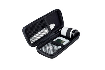 Home kit for measuring blood glucose levels. In a carrying case on a white background. Isolant. Digital glucose meter, lancet pen, disposable needles and test strips in a black case. View from above.