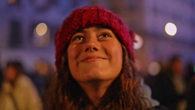 Little girl enjoying Christmas, while looking at the lantern lights in Bayonne, France.