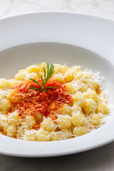 gnocchi with tomato sauce and parmesan cheese
