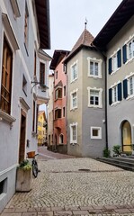 Fototapeta premium Picturesque view of an old street in the historic town of Klausen (Italian: Chiusa) in South Tyrol in northern Italy