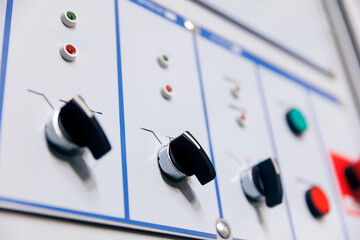 Switchboard equipment high voltage of power plant. Control panel with light lamp