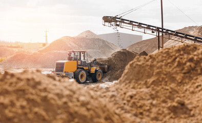Yellow Excavator working on sand industrial quarry. Construction site industry banner concept
