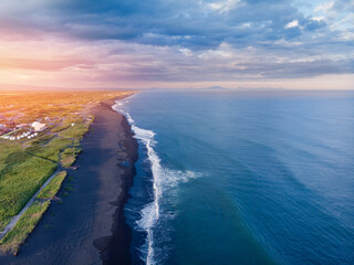 Aerial top view Landscape of Khalaktyrsky beach with black volcanic sand coast of Ocean Kamchatka, Russia