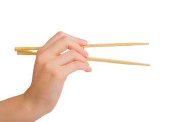 Hand holding chopsticks, Asian food sticks isolated on white background png