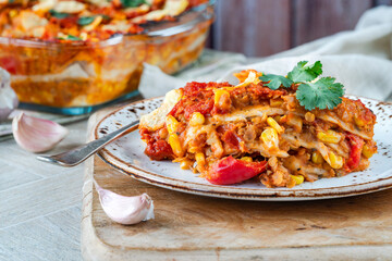 Vegetarian enchilada bake with smoky lentils and sweetcorn