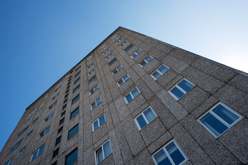 apartment building, brutalist architecture, pebbledash cladding.