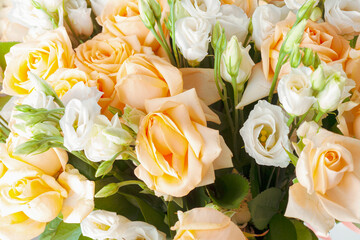 bouquet of roses and lisianthus of different colors close