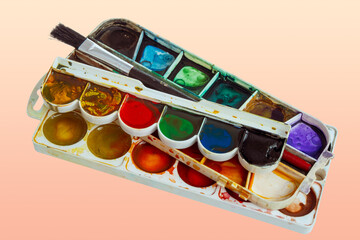 palette with watercolor paints close-up, macro, colorful background of the artist's palette, drawing, study