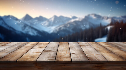 Empty wooden table with scenic moutains and snow in blurry background