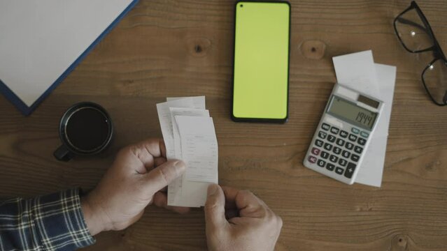 man making payment by smartphone mobil application