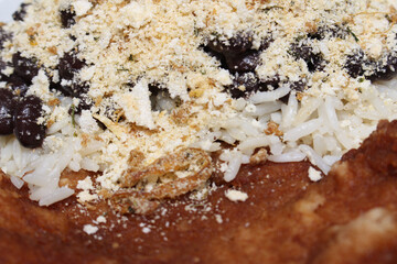 beans with rice and farofa and breaded meat. typical Brazilian food. food with selective focus.