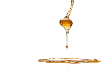 Sweet honey spill drip isolated on transparent or white background