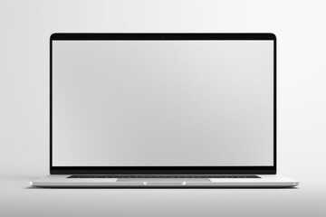 A laptop computer with a blank screen sitting on a table. Suitable for various technology-related concepts and presentations