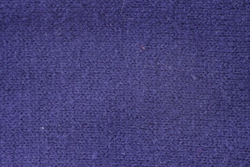 Blue sweater fabric close up 