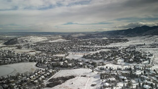 Aerial of snowy Ken Caryl Ranch neighborhood in Littleton Colorado in winter