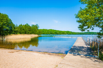 Beach and rest area at lake Hancza , Suwalki Landscape Park, Podlasie, Poland