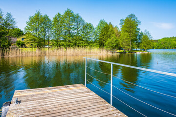 Pier at beautiful lake in Suwalski Landscape Park, Podlasie, Poland