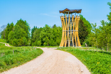 Wooden observation tower along rural road in Suwalski Landscape Park, Podlasie, Poland