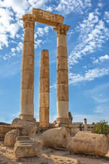 Fototapeta premium Columns of ruins of the uncompleted Roman Temple of Hercules at the Amman Citadel. Amman. Jordan. Vertically. 