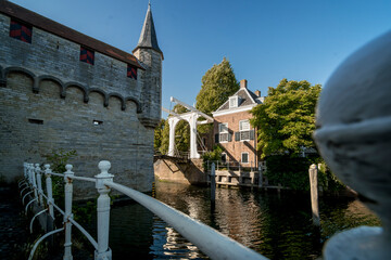 Dutch Draw Bridge and medieval fortifications of a water gate with passage to inner harbor in old...