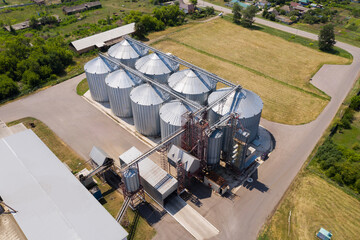 Aerial view of agricultural silos, grain elevator for storage and drying of cereals.