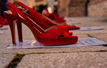 Red shoe, symbol against violence against women.