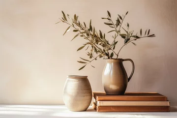 Gordijnen Neutral Mediterranean home design. Textured vase with olive tree branches, cup of coffee. Books on wooden table. Living room still life. Empty wall copy space. Modern interior, no people. Lateral view © Mayava