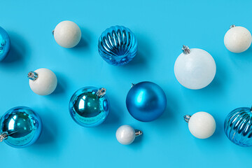 Many Christmas balls on blue background