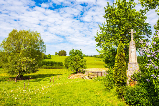 Small temple in farming fields In Suwalski Landscape Park during spring season, Podlasie, Poland