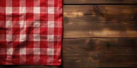 Obraz premium Red napkin on a wooden table in the kitchen, top view, space for text. Generative AI