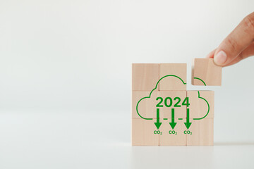 Green business, Reducing carbon emissions target in 2024. Climate action, carbon offset, neutrality...