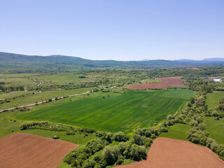 Obraz premium Aerial view of rural land near town of Godech, Bulgaria