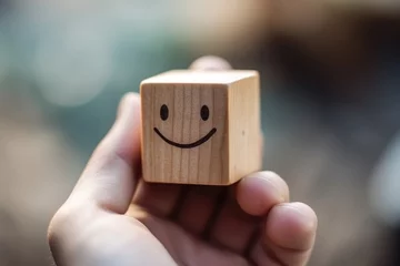 Foto op Canvas Smiling wood happy face Smiley Laugher, friendly happy square cube wooden smile satisfied client review experience, customer success, client service good positive feedback, lucky affirmation © Kerstin