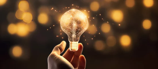 Foto op Plexiglas Hand holding virtual light bulb image idea discovery sign © zaen_studio