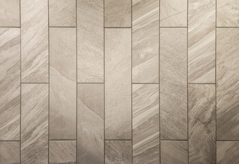 Beige shower wall tiles with grout