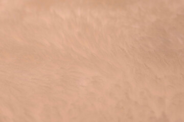Peach Fuzz sheepskin texture with soft hairs, natural fur for designer, the concept of processing, production of furrier products, stress relief, psychological stress
