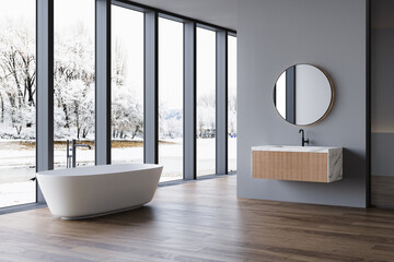 Modern bathroom interior with winter concept, white bathtub and chic vanity, black walls, parquet...