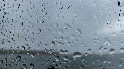 photograph of water droplets on a glass as a background