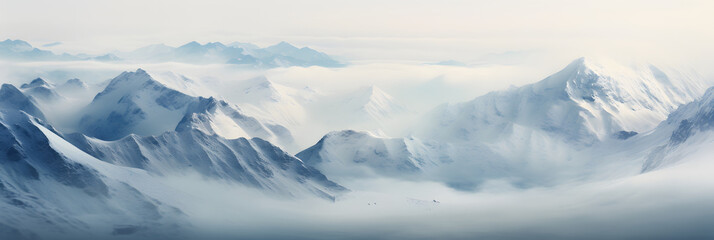 Fototapeta na wymiar a panoramic view of snowy mountains with snow covered peaks covered with fog and snow in winters