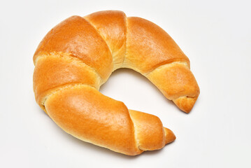 Fresh baked bagel isolated on white background.