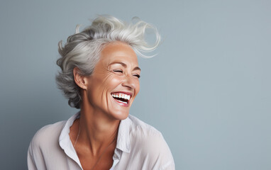 portrait of a mature woman Smiling with gray hair  