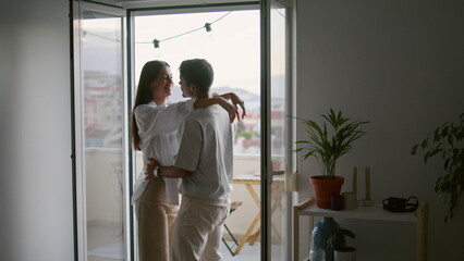 Love couple hugging hotel closeup. Romantic people moving in dance together