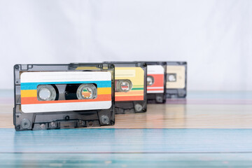 Row of colorful retro style music cassettes.
