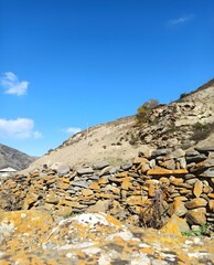 stone wall with sky