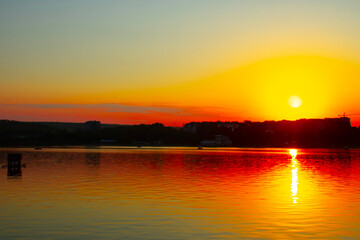 Nature landscape. reflection, blue sky and yellow sunlight. landscape during sunset.