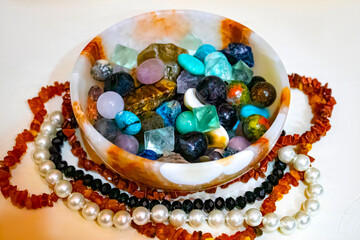 the esoteric and magical gems stones on the plate